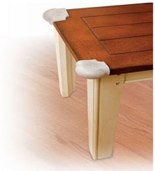 rendering of wooden table with softer corner guards protecting the edges