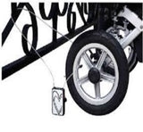 stroller with wheel secured to a gate using the Buggygear stroller lock