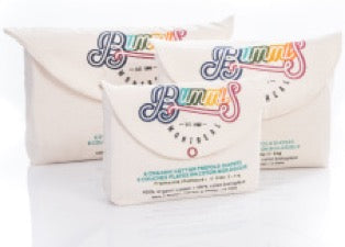 three packs of Bummis pre-fold diapers on white background