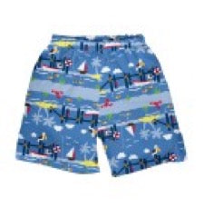 pair of i play. by green sprouts swim trunks in blue on white background