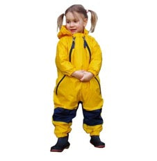 girl in pigtails wearing yellow Muddy Buddy waterproof coveralls