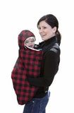 Woman holding baby in red plaid fleece snuggle cover
